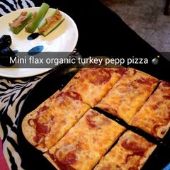 A picture of Flax seed flat bread pizza.