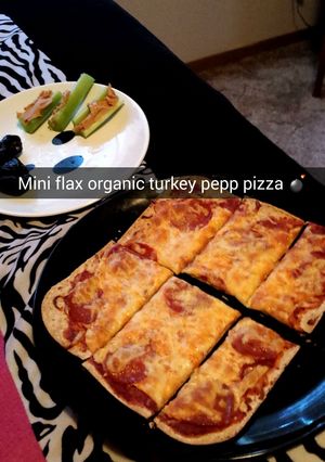 A picture of Flax seed flat bread pizza.