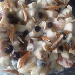 A picture of Fruits & black chickpeas salad with creamy_mayo dressing.