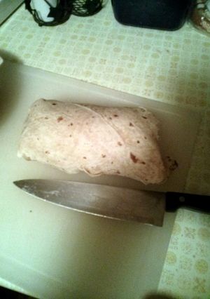 A picture of The Fully Loaded Quesadilla Breakfast Burrito.