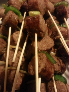 A picture of Italian sausage kabobs.