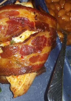 A picture of Bacon wrapped, jalepeno popper chicken.