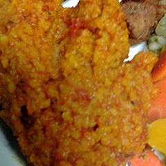 A picture of Tomatoes and rice.