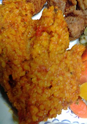 A picture of Tomatoes and rice.