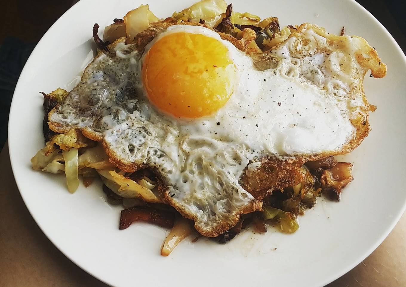 Egg topped southern fried cabbage