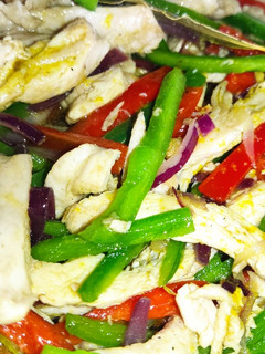 Una foto de Fajitas de pollo con pimentones