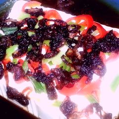 A picture of Steamed silken tofu with fried onion.