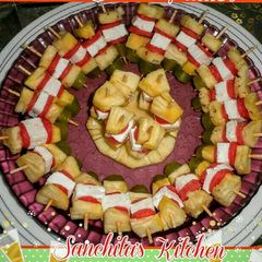 A picture of Pineapple Cheese Salad Skewers.