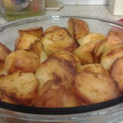 A picture of Lovely crisp, soft and fluffy inside roast potatoes.