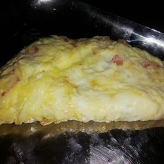 A picture of Cheese and Tomato Omlette.