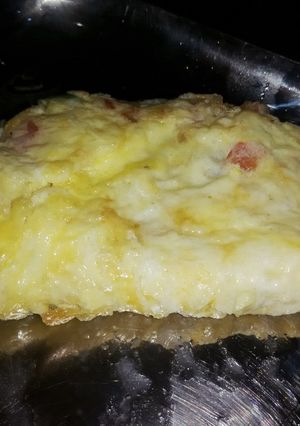 A picture of Cheese and Tomato Omlette.