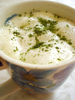 A picture of Hot Matcha Milk with Marshmallows.