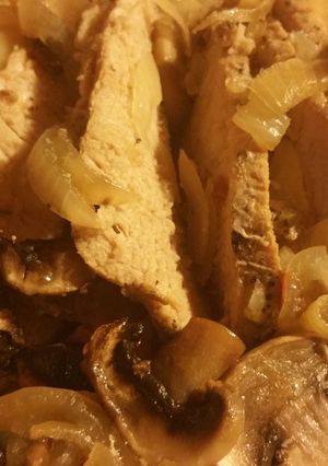 A picture of Mushroom onion pork tenderloin.