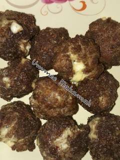 A picture of Cheese stuffed meatballs.