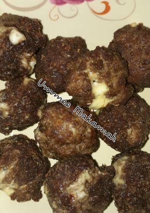 A picture of Cheese stuffed meatballs.