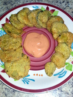 A picture of Gluten Free Fried Pickles w/ Sriracha Dip.