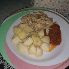 A picture of Boil potatoes with my leftover stew and fried egg.