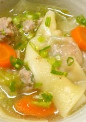 A picture of A Wonton Soup with Plenty of Vegetables.