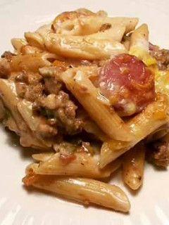 Una foto de Macarrones con carne, mortadela y bechamel de jengibre