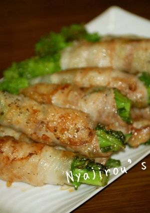 A picture of Broccolini Pork Wraps.