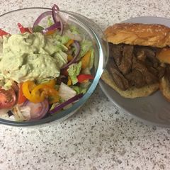 Garlic Fried Lamb and an Advacado garlic sauce salad A picture of Garlic Fried Lamb and an Advacado garlic sauce salad.