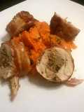 Bacon wrapped sausage stuffed chicken with sweet potatoes