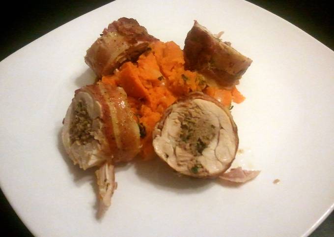 Bacon wrapped sausage stuffed chicken with sweet potatoes