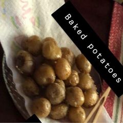A picture of Oven-baked baby potatoes.