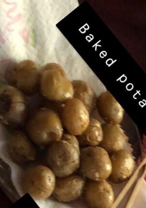 A picture of Oven-baked baby potatoes.