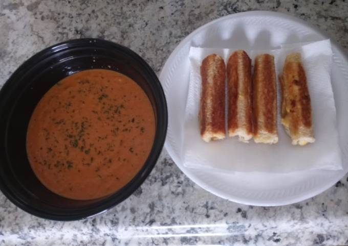 Homemade tomato basil soup with grilled cheese roll ups