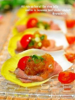 A picture of Beef on Endive with Ume Gelée Sauce.