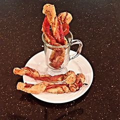 A picture of Bacon Wrapped Cheese Breadsticks.