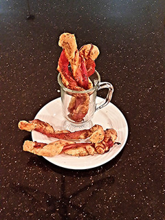 A picture of Bacon Wrapped Cheese Breadsticks.