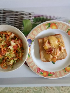 A picture of Cheese on bacon and salad.