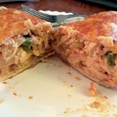 A picture of Cheesy chicken enchiladas.