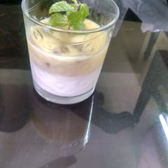 A picture of Panacotta with custard topping.