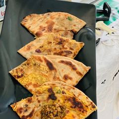 Besan-onion stuffed paratha A picture of Besan-onion stuffed paratha.