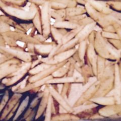 A picture of Oven Baked PARMESAN And Garlic Fries.