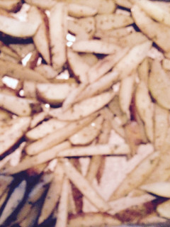 A picture of Oven Baked PARMESAN And Garlic Fries.