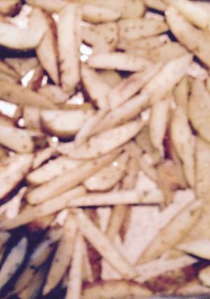 A picture of Oven Baked PARMESAN And Garlic Fries.