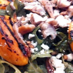 A picture of Grilled Chicken & Peach Salad w/ Sweet Tea Vinaigrette.