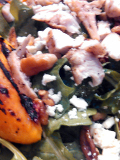 A picture of Grilled Chicken & Peach Salad w/ Sweet Tea Vinaigrette.