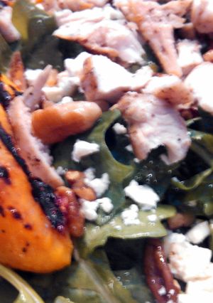 A picture of Grilled Chicken & Peach Salad w/ Sweet Tea Vinaigrette.