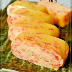 A picture of Tamagoyaki Rolled Omelet with Red Pickled Ginger.