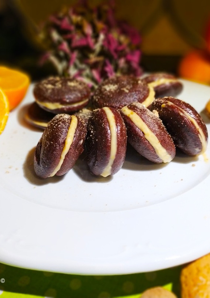 Una foto de Macarons de Chocolate, Almendras y Mandarina Sin Gluten