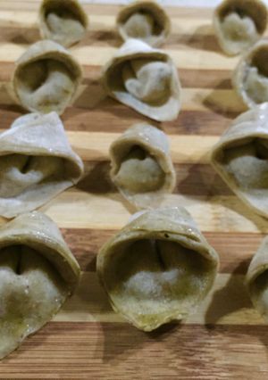 A picture of Home made Tortellini stuffed with Basil Pesto.