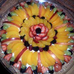 A picture of chocolate chip shortbread fruit pizza.