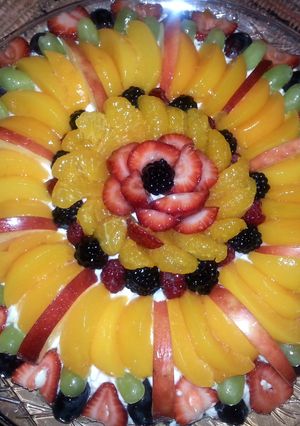 A picture of chocolate chip shortbread fruit pizza.