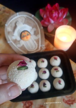A picture of Orange Kacha Golla/ Pranhara (with Orange Candied Peels).