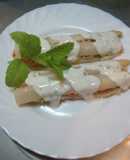 Espárragos rellenos y con salsa de queso